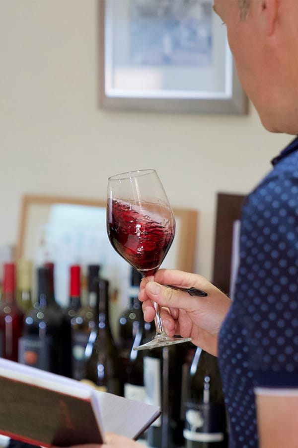 Red-organic-wine-being-swirled-in-glass